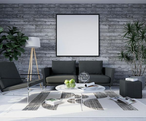 Interior of a bright, clean yoga studio with plants and natural light.